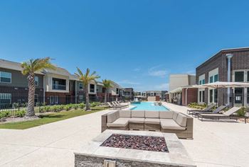 Firepit Area With Pool View at Century Palm Bluff, Portland, TX